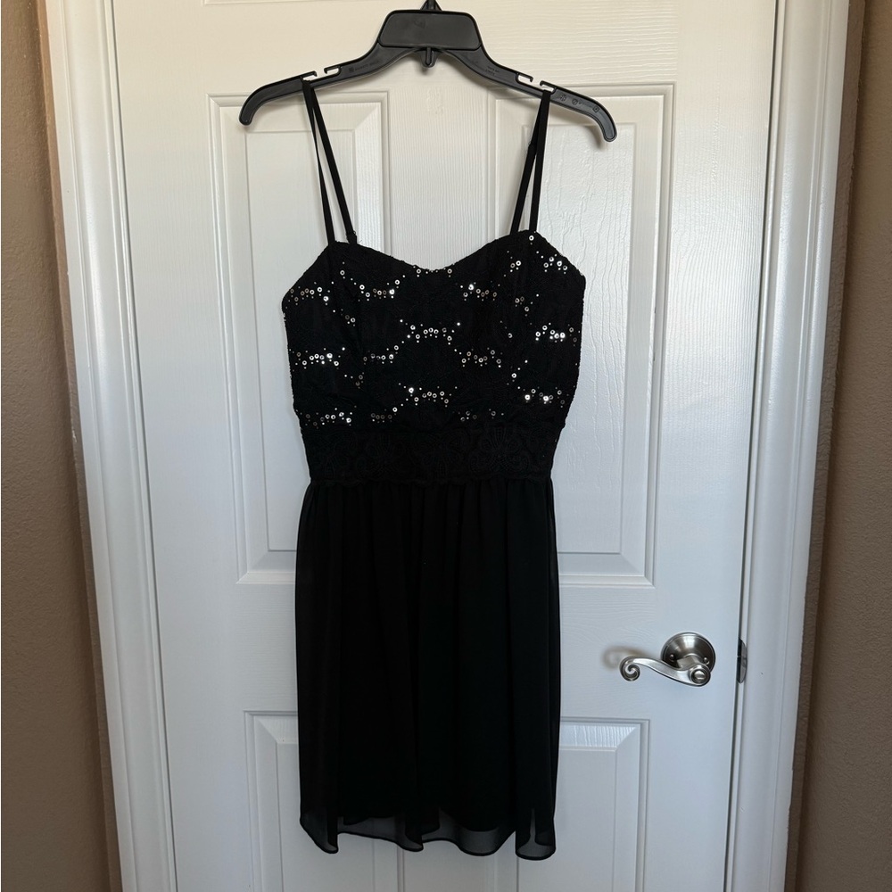 Black sleeveless mini dress